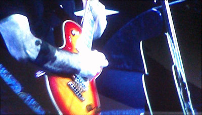 Joe Satriani's incendiary guitar work drives the band's sound
